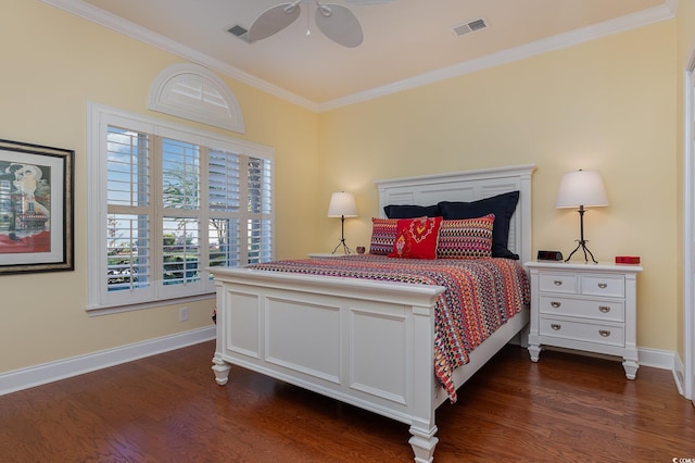 bedroom with ceiling fan, dark hardwood / wood-style flooring, and crown molding