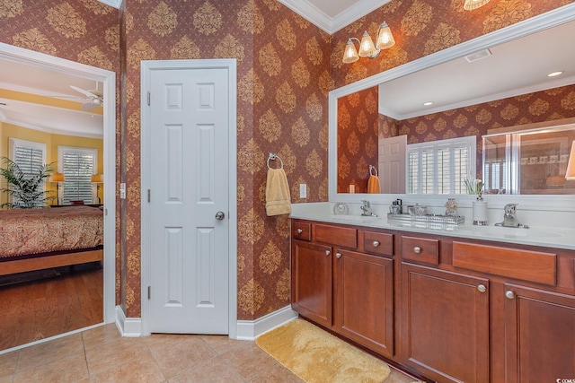 bathroom with crown molding, tile patterned flooring, vanity, and an enclosed shower