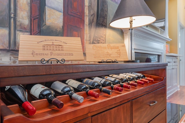 wine cellar with hardwood / wood-style flooring