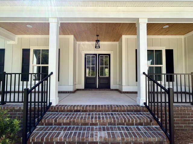 entrance to property with a porch