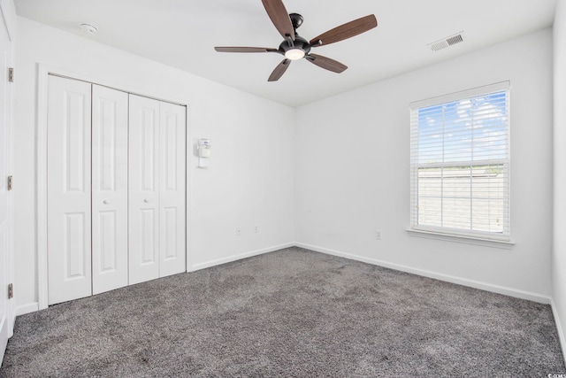 656 Pistoia Ln Unit 304, Myrtle Beach, SC 29579 - unfurnished bedroom with a closet, baseboards, carpet flooring, and visible vents