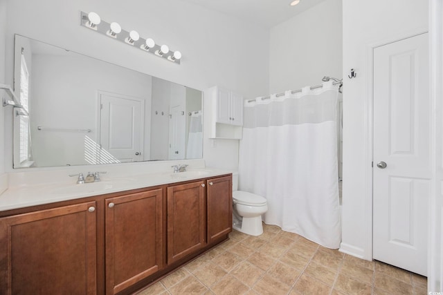 656 Pistoia Ln Unit 304, Myrtle Beach, SC 29579 - bathroom featuring a sink, curtained shower, toilet, and double vanity