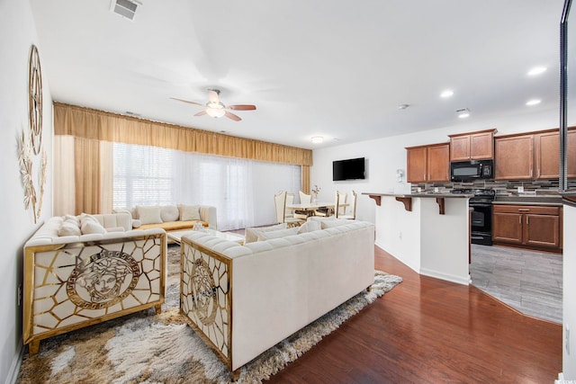 656 Pistoia Ln Unit 304, Myrtle Beach, SC 29579 - living room with recessed lighting, ceiling fan, dark wood finished floors, and visible vents