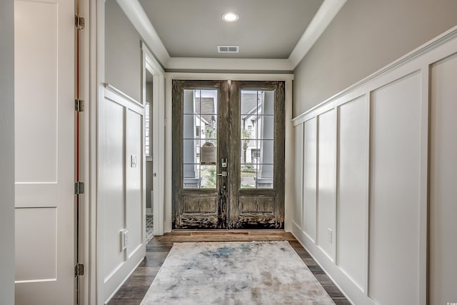 doorway to outside with dark hardwood / wood-style flooring and french doors