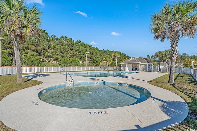 view of pool featuring a patio area