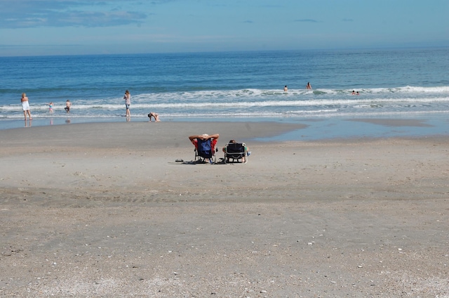 view of water feature featuring a beach view