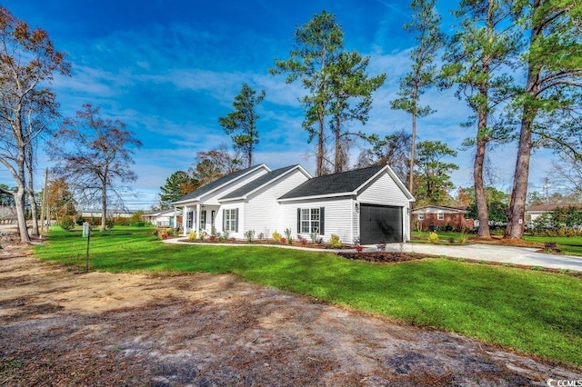 exterior space with a front yard and a garage