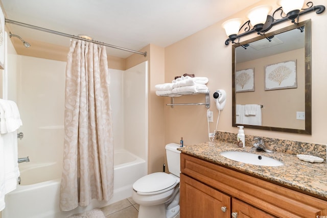 full bathroom with toilet, shower / tub combo, vanity, and tile patterned floors