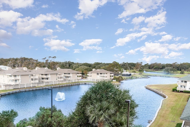 view of pool featuring a water view