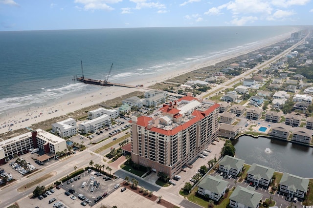 drone / aerial view with a view of the beach and a water view