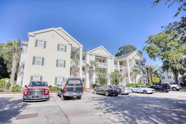 601 Hillside Dr N Unit 4133, North Myrtle Beach, SC 29582 - view of building exterior with uncovered parking