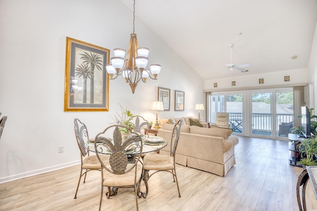 601 Hillside Dr N Unit 4133, North Myrtle Beach, SC 29582 - dining area featuring high vaulted ceiling, light wood-style floors, a ceiling fan, a chandelier, and baseboards