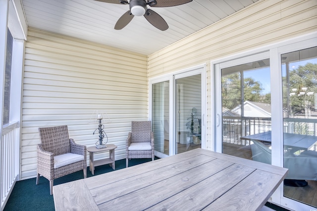 wooden terrace with ceiling fan