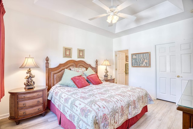 bedroom featuring light hardwood / wood-style floors and ceiling fan