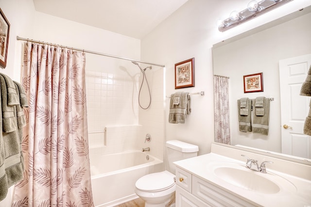 full bathroom with vanity, toilet, and shower / tub combo