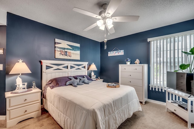 2226 Huntington Dr Unit D, Surfside Beach, SC 29575 - bedroom featuring carpet floors, a textured ceiling, baseboards, and a ceiling fan