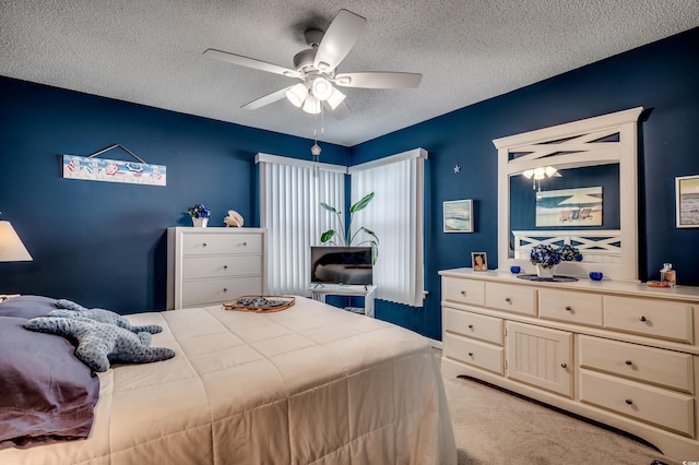 2226 Huntington Dr Unit D, Surfside Beach, SC 29575 - bedroom with light carpet, a textured ceiling, and a ceiling fan