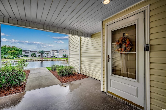 2226 Huntington Dr Unit D, Surfside Beach, SC 29575 - doorway to property with a water view and a residential view