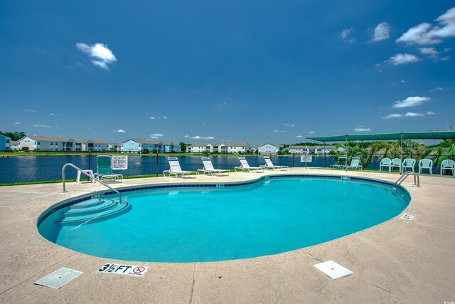 2226 Huntington Dr Unit D, Surfside Beach, SC 29575 - community pool with a residential view and a patio area