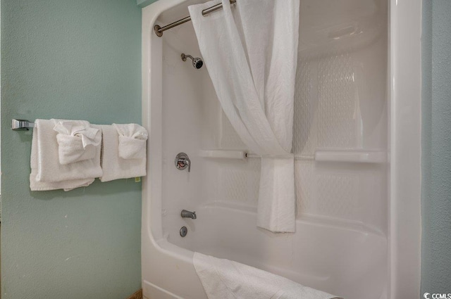 bathroom featuring shower / bath combo