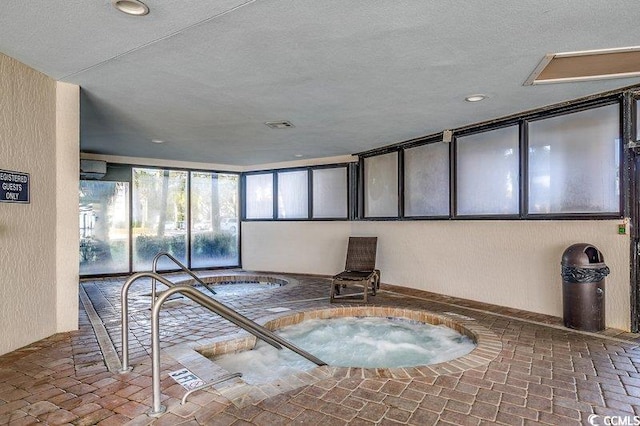 interior space with an indoor hot tub