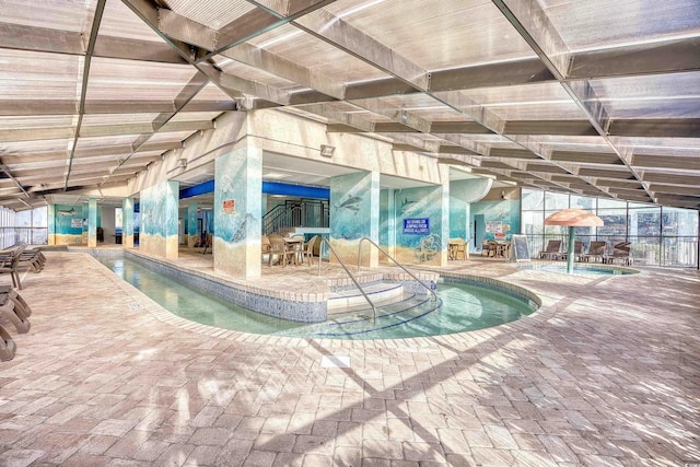 community pool with a patio