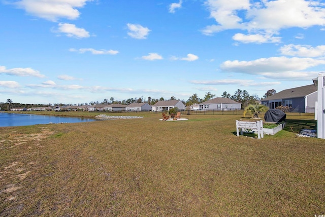 view of yard featuring a water view