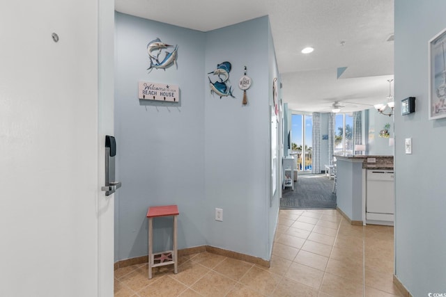 hallway with light tile patterned floors