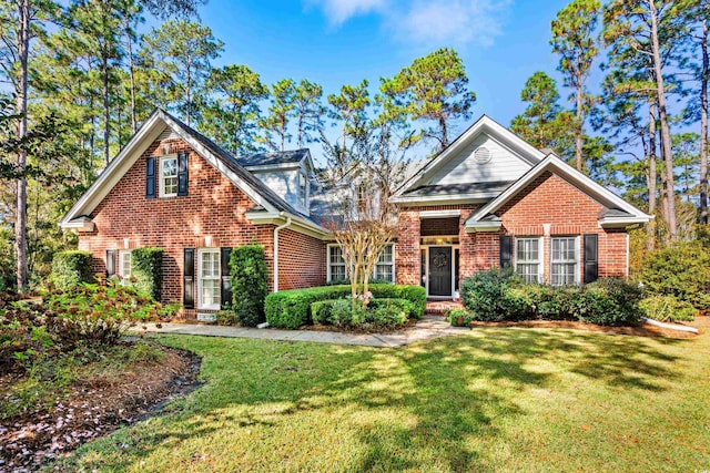 4491 Horseshoe Bnd, Murrells Inlet, SC 29576 - traditional-style house with brick siding and a front yard