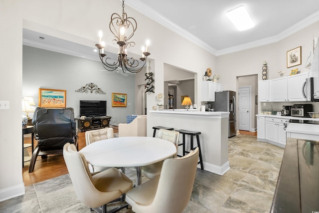 4491 Horseshoe Bnd, Murrells Inlet, SC 29576 - dining space with ornamental molding, a chandelier, and baseboards