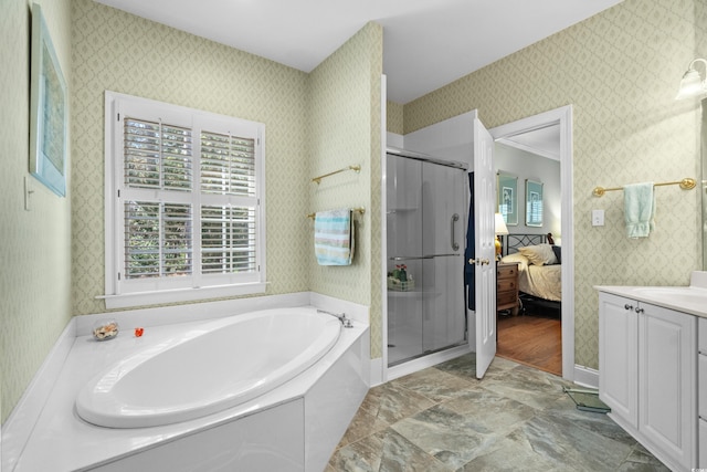 4491 Horseshoe Bnd, Murrells Inlet, SC 29576 - ensuite bathroom with vanity, a garden tub, a shower stall, and wallpapered walls