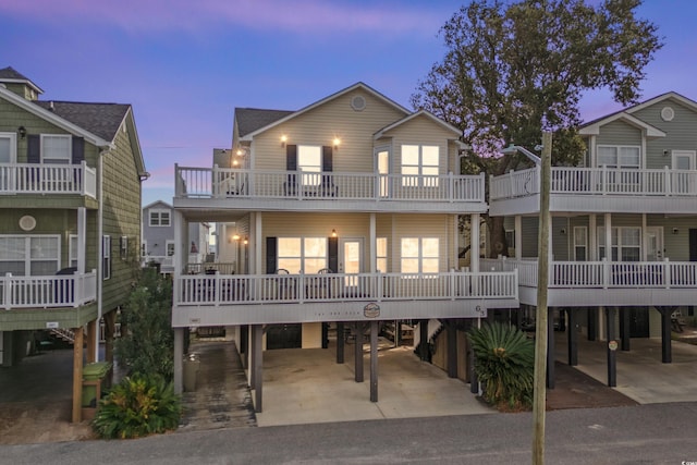 view of front of home with a balcony