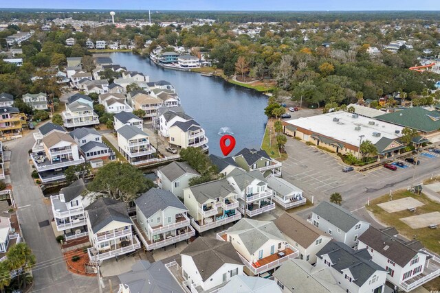 bird's eye view with a water view