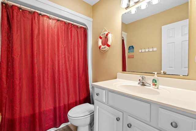 full bathroom with vanity, hardwood / wood-style flooring, toilet, and shower / bath combo with shower curtain