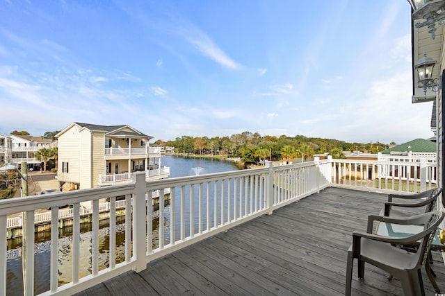 deck featuring a water view