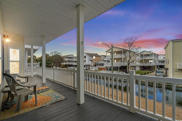 deck at dusk with a water view