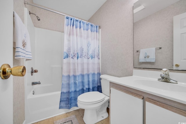 full bathroom featuring tile patterned flooring, shower / bath combination with curtain, toilet, and vanity