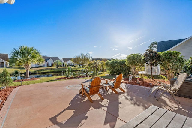 view of patio / terrace featuring a water view