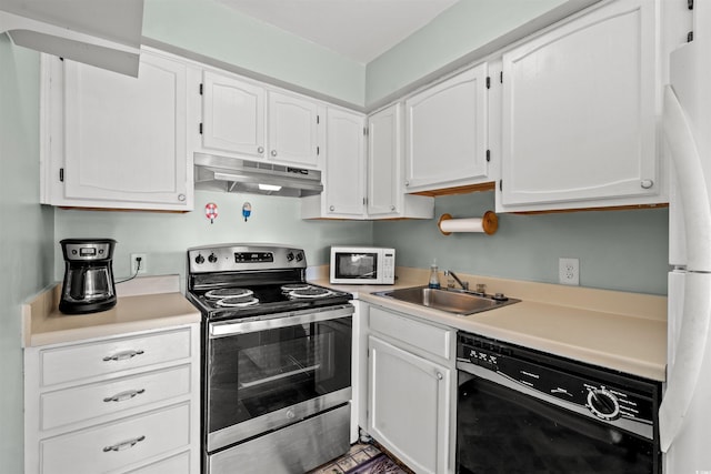 kitchen with white appliances, white cabinetry, and sink