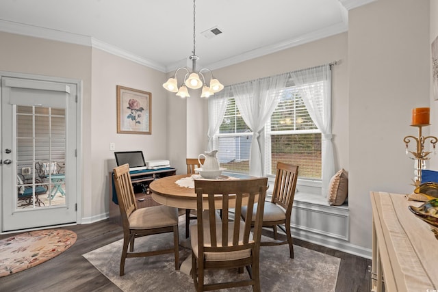 dining space with visible vents, baseboards, a chandelier, dark wood-style floors, and crown molding