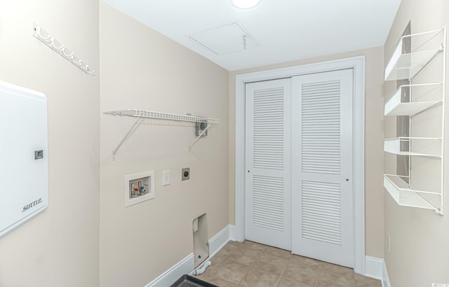 laundry room featuring washer hookup, hookup for an electric dryer, and light tile patterned flooring