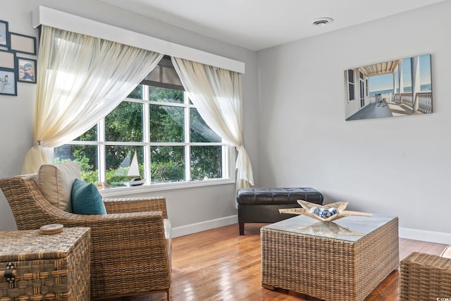 living area featuring hardwood / wood-style flooring