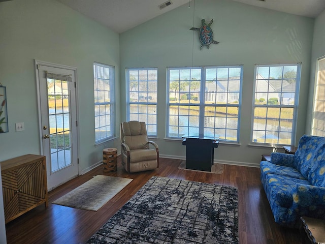 sunroom featuring a healthy amount of sunlight and lofted ceiling