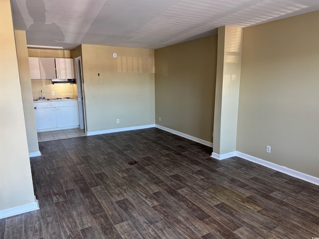 interior space with dark hardwood / wood-style floors