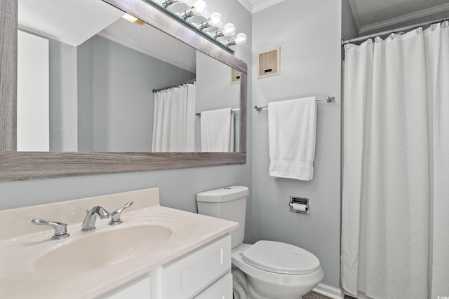 bathroom with vanity, a textured ceiling, toilet, and crown molding