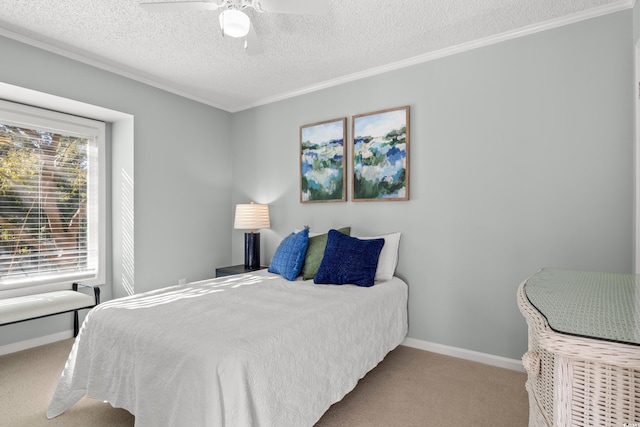 carpeted bedroom featuring ceiling fan, crown molding, and a textured ceiling