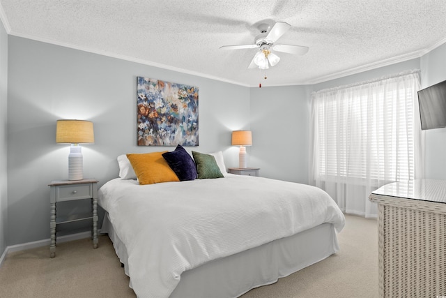 bedroom featuring a textured ceiling, ceiling fan, ornamental molding, and light carpet