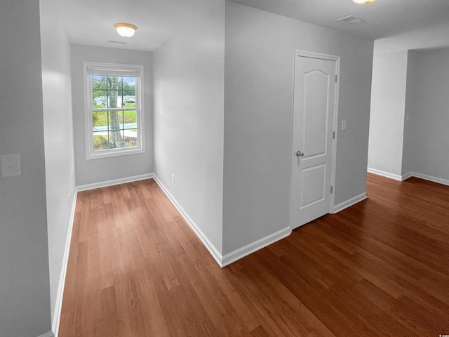 hall featuring wood-type flooring