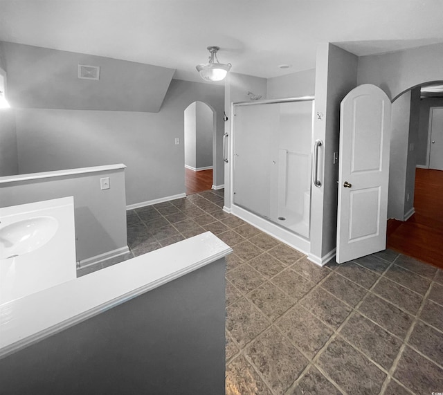 bathroom with sink and hardwood / wood-style flooring