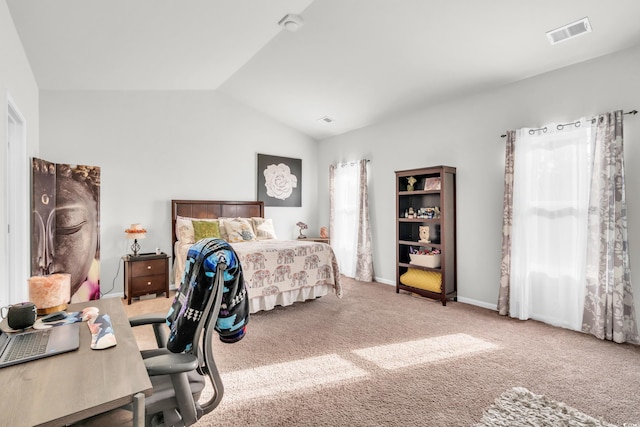 bedroom with carpet flooring and lofted ceiling